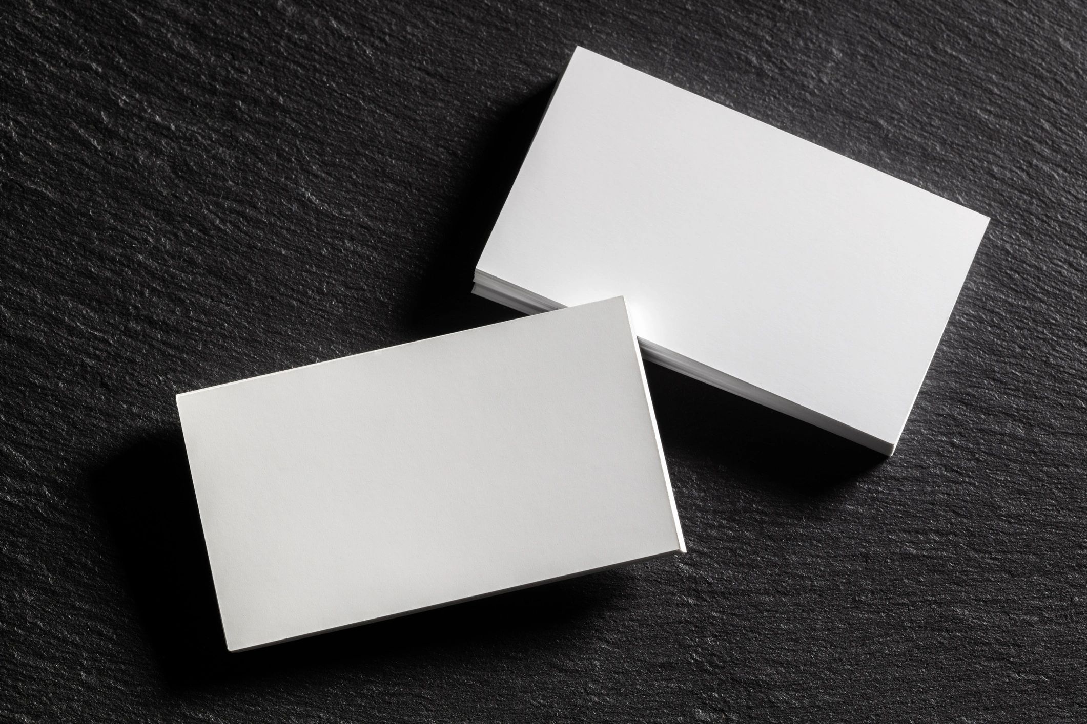 Brand identity mockup on black background