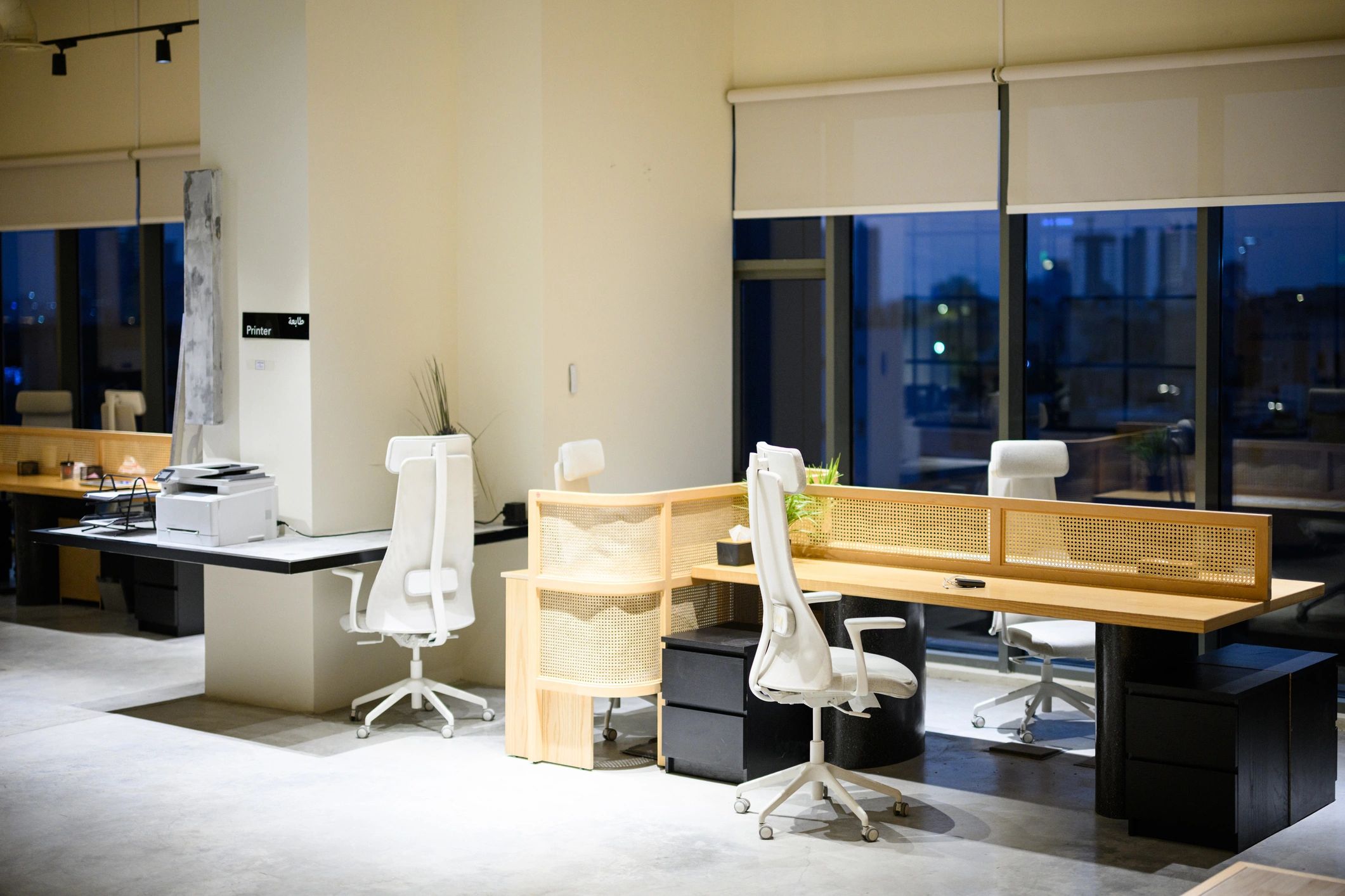 Contemporary coworking office interior with shared desks